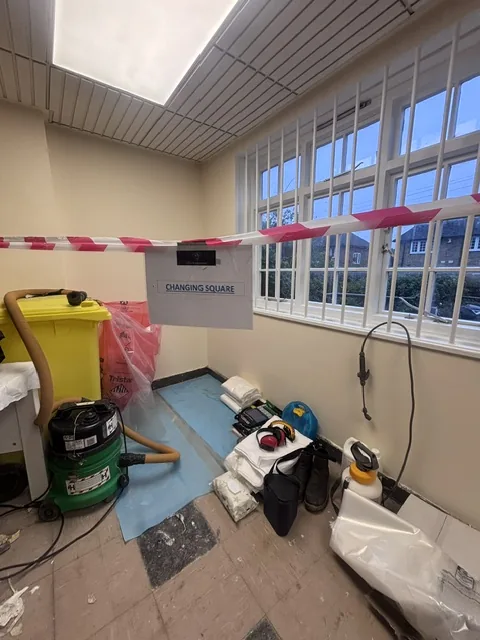 Asbestos floor tile and bitumen removal in Merton